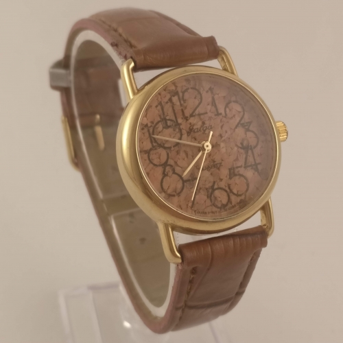Dames Horloge, Wijzerplaat van Kurk, Linkerkant